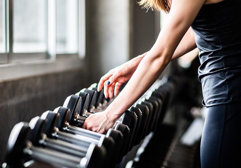 How to Do the Dumbbell Military Press: Seated, Standing & Tips