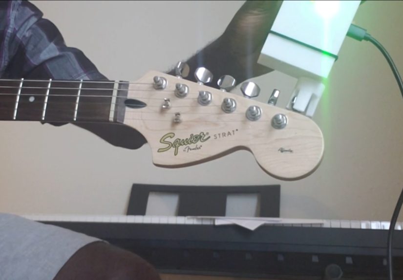 Handheld Bot Takes The Tedium Out Of Guitar Tuning
